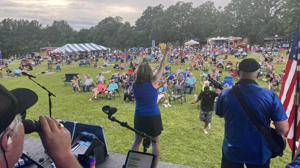 Residents gathered for an outdoor community event in Wingate